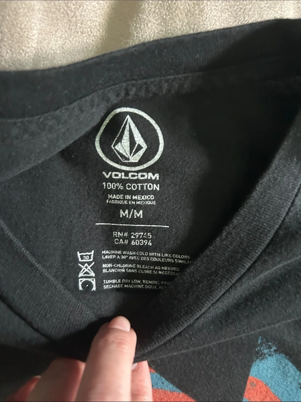Men’s Volcom shirt black with blue red front design size M great condition